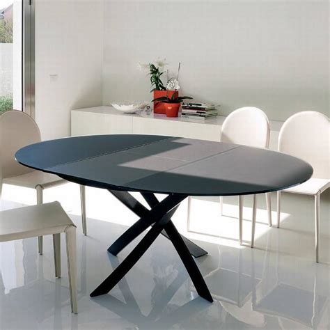 In many round dining tables, you can find a removable counter or a foldable one, which allows you to turn the table into half its size or store it elsewhere while you can accessories your round dining table with both armless chairs as well as armchairs, the former is better for a cozy setting and the. - Ultra Modern in 2019 | Round dining table, Round dining table modern, Modern dining table