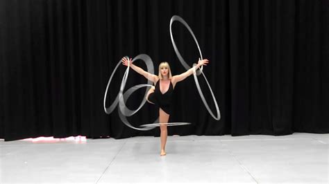 Circus Performer Does A Mesmerizing Performance With Six Hula Hoops