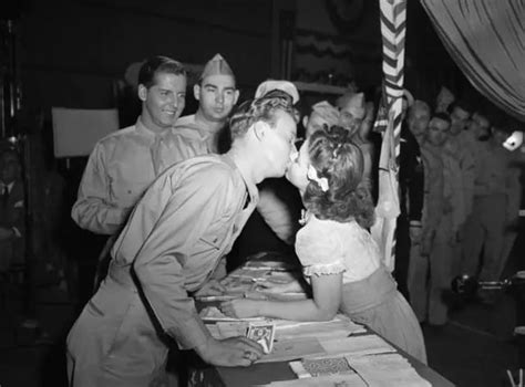 Shirley Temple — Not So Innocent — Kissing A Marine Who’d Had A Bit Part In Her Movie “the