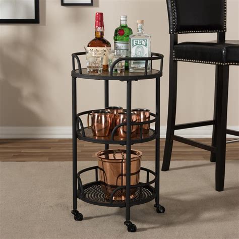 If your chairs have metal frames, for instance, embrace a cohesive vibe with a metal outdoor table. Baxton Studio Bristol Black Metal and Brown Wood Mobile ...