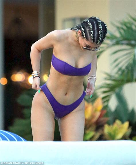 Kylie Jenner Shows Off Her Curvaceous Body In A Purple Bikini
