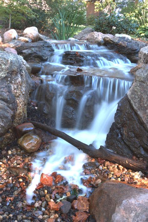 Having a pond or water feature installed in your garden will bring any area to life and add feel of tranquility. Pondless Waterfall « Buck's Landscape Material