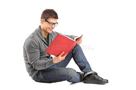 Smiling Guy Sitting On A Floor And Reading A Book Stock Photo Image Of Learn Pose