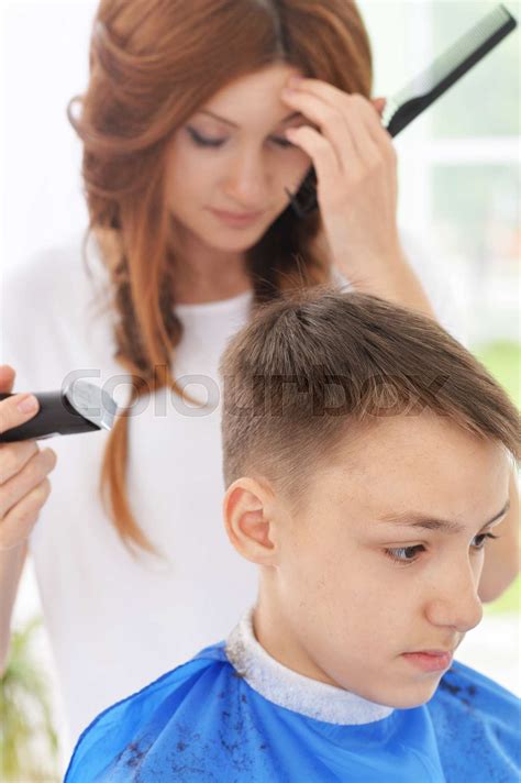 Boy Getting Haircut Stock Image Colourbox