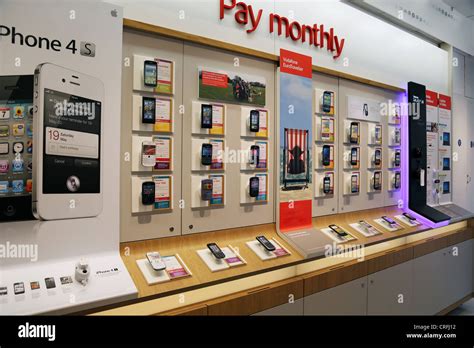 Mobile Phone Display In Mobile Phone Shop Surrey England Stock Photo