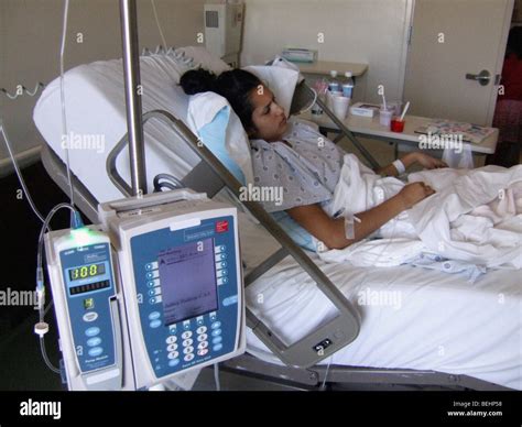 Teenaged Patient Laying On Hospital Bed Stock Photo Alamy