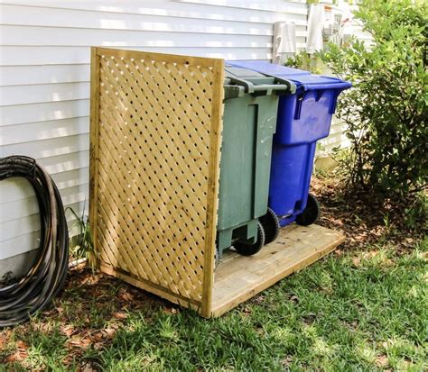 Jun 29, 2017 · we simply measured the correct distance, hammered the stakes halfway into the ground, slid the posts on top of them, and put the inserts into the grooved posts. SIMPLE DIY WAY TO HIDE YOUR TRASH CANS | Outdoor trash ...