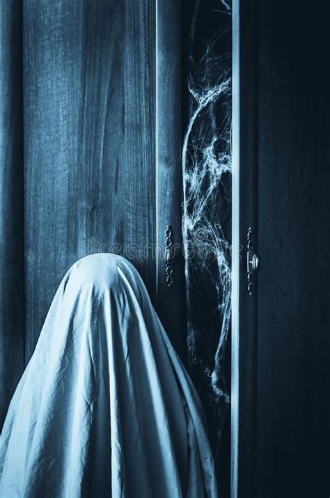 Ghost Near Creepy Wardrobe With Spiderweb Inside Stock Photo Image Of