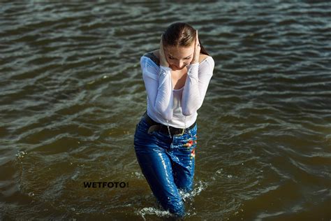 Wetlook By Gorgeous Girl In Wet Tight Jeans Blouse And Jacket On The Lake
