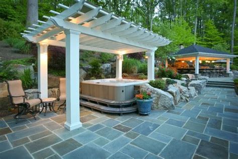 This airy enclosure provides both privacy and a degree of protection from the elements, and allows this hot tub easy accessibility all year round. 31 Awesome Hot Tub Enclosure Ideas: #22 is the Coolest Ever!