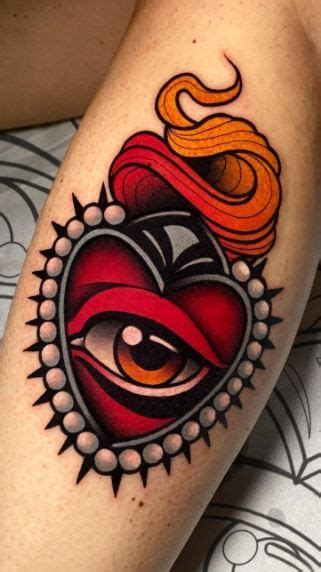 Heart Tattoos Meaning Sacred Heart Tattoos Heart Tattoo Designs