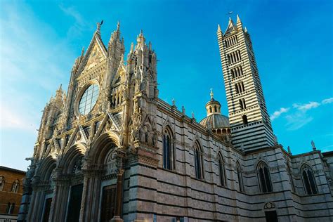 Siena Cathedral Duomo Di Siena On A Beautiful Sunny Day With Blue Sky