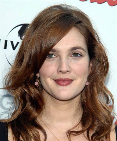 If there's one hair accessory barrymore comes back to time and time again, it's a single flower blossom. 10 Drew Barrymore Hairstyles, Hair Cuts and Colors