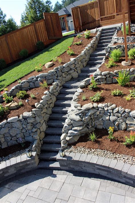 stone block steps for a steep location sloped garden with steep hillside landscaping ideas