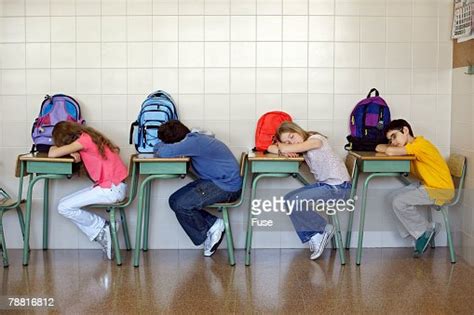 Students Laying With Heads Down On Desks Foto De Stock Getty Images