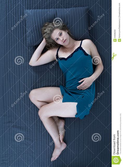 Woman Lying Alone In Bed Stock Photo Image Of Nightdress