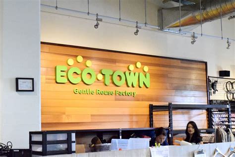 Eco Town Primary Logo Signage Clarence Lee Design Associates Llc