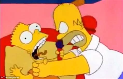Squirrels Mimic Homer And Bart Simpson As One Has The Other By The Neck Daily Mail Online