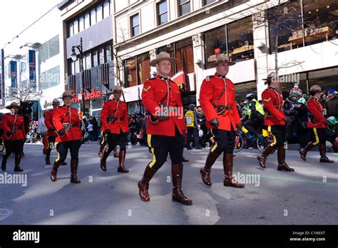 Canadian Mounties Marching On Ste Catherine Street In Montreal During