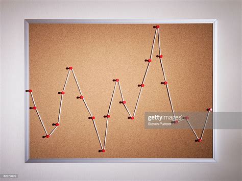 Push Pins And String On Bulletin Board High Res Stock Photo Getty Images