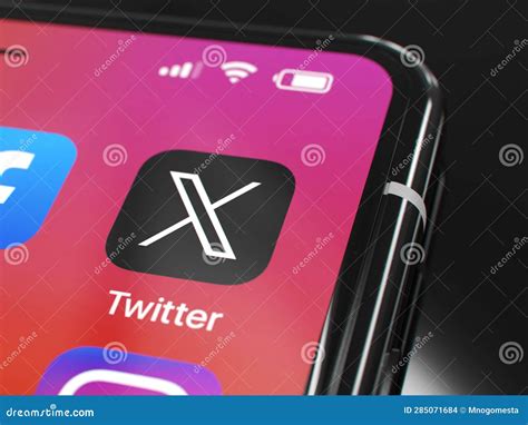 The New Twitter App Icon In The Form Of An X On A Smartphone Screen