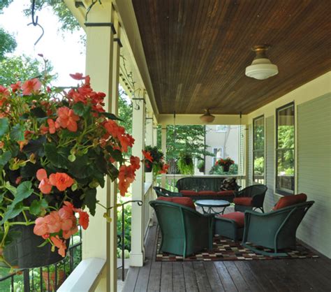 You're ready to dive in and make your porch a beautiful part of your home, so we've got some wrap around porch ideas for you. Large wrap-around porch addition - Transitional - Porch ...