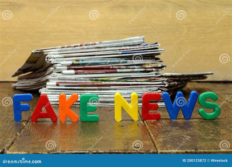 Closeup Shot Of Fake News Concept With Newspapers And Letters Stock