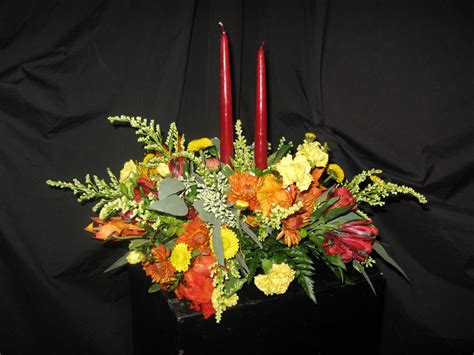 Fall Centerpiece With Two Candles Arrangement Williamsburg Floral