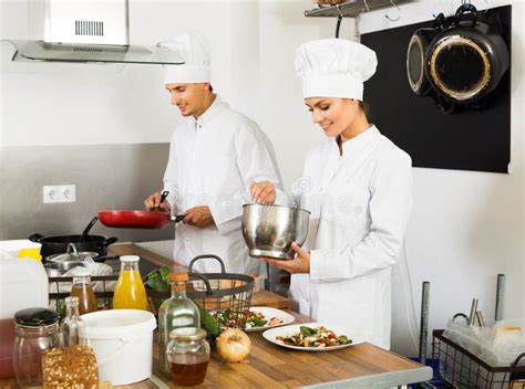 Two Chefs Cooking Food Stock Image Image Of Uniform 245023497