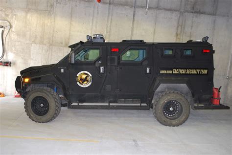 Homeowners Can Venture Outside But There Are Swat Team Style Trucks