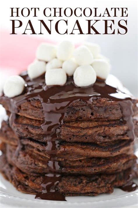 A Stack Of Chocolate Pancakes With Marshmallows On Top And The Words