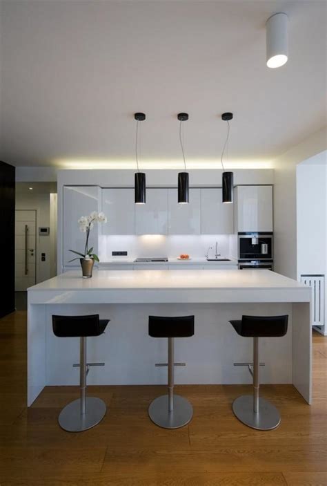 Contemporary White Kitchen With Black Bar Stools And White Island