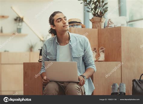 Shop Owner Using Laptop Stock Photo By ©allaserebrina 160631136