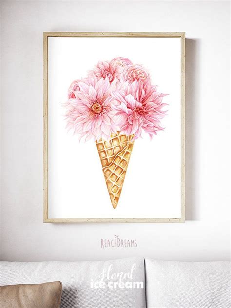 An Ice Cream Cone With Pink Flowers In It Is Hanging On The Wall Above A Couch