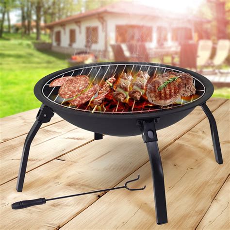This small camping fire pit folds flat making it convenient to pack and carry. Outdoor Portable 22″ 4 Leg Folding Fire Pit Fireplace - By ...