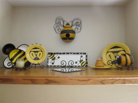 A Collection Of Bee Themed Items Decorates This Mantel Bumblebee