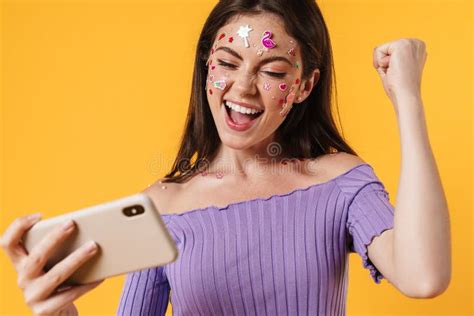 Image Of Excited Nice Woman Expressing Surprise And Using Cellphone