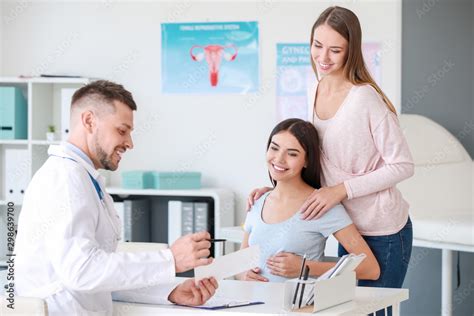 Lesbian Couple Visiting Male Gynecologist In Clinic Stock Photo Adobe Stock