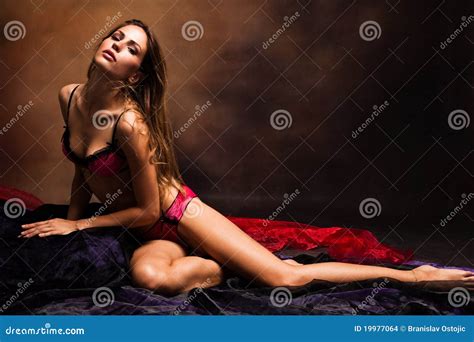 Sensual Woman Lying On Bed Stock Photography CartoonDealer Com 21628604