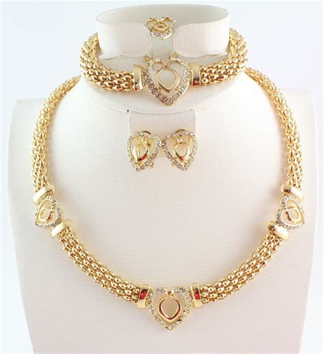 Check out our women gold chain selection for the very best in unique or custom, handmade pieces from our chains shops. Free shipping hot sale heart design costume necklace set fashion top quality african gold Color ...