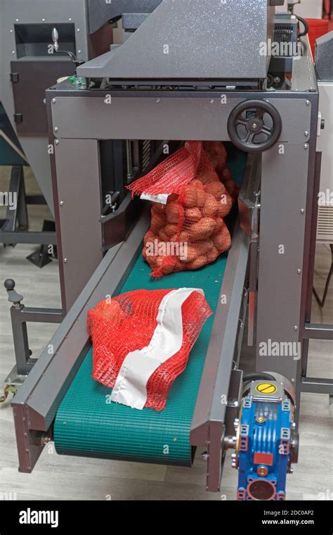 Potato Packing In Sack Bags Conveyor Belt Machine Stock Photo Alamy
