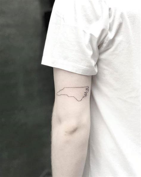 North Carolina Map Outline Tattoo On The Back Of The