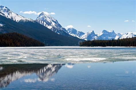 Rocky Mountains Reflecting In Maligne Lake Jasper National Park
