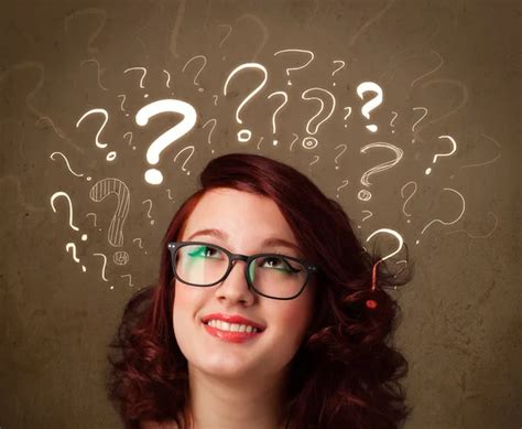 Girl With Question Mark Symbols Around Her Head Stock Photo By