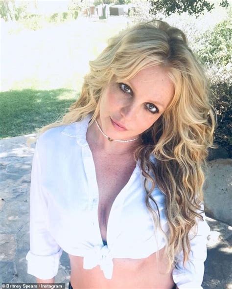 Britney Spears Flashes Her Toned Midriff In Her Latest Ethereal