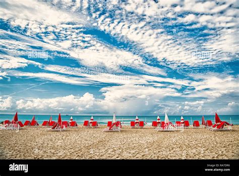 South Beach Miami Sea Beach With Sunbeds And Umbrellas On Natural