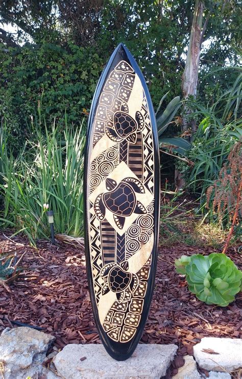 Shop now for hawaiian home decor. Hand made Hawaiian style surfboard with turtle design and tribal carvings. Made from mango wood ...