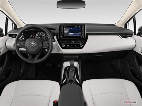 38***, 4dr, white exterior, black interior, continuously variable transmission. Toyota Corolla Dashboard