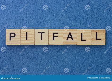 Text On Gray Word Pitfall In Small Wooden Letters With Black Font Stock