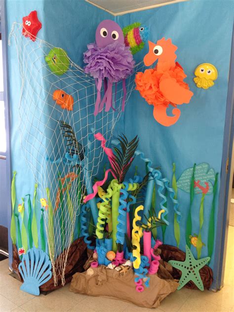 An Ocean Scene Made Out Of Construction Paper With Sea Animals And Fish